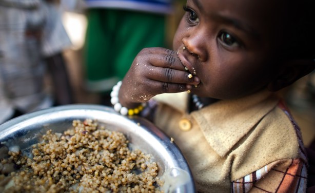 little african child eats