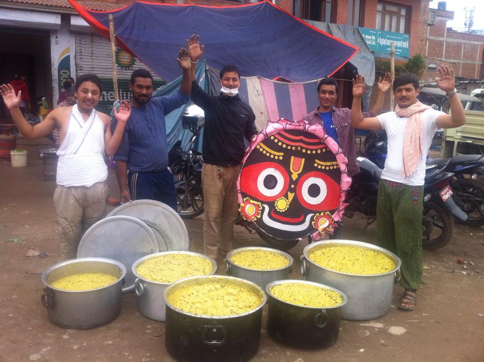 Giving food for needy in Kathmandu