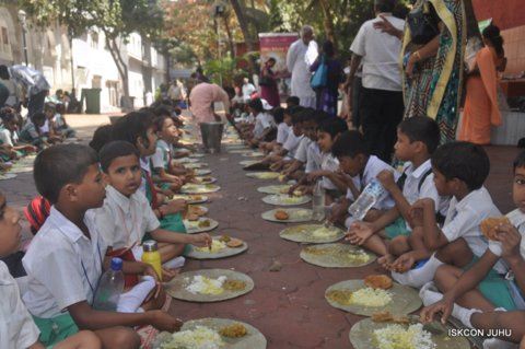 Many Children Eating Food