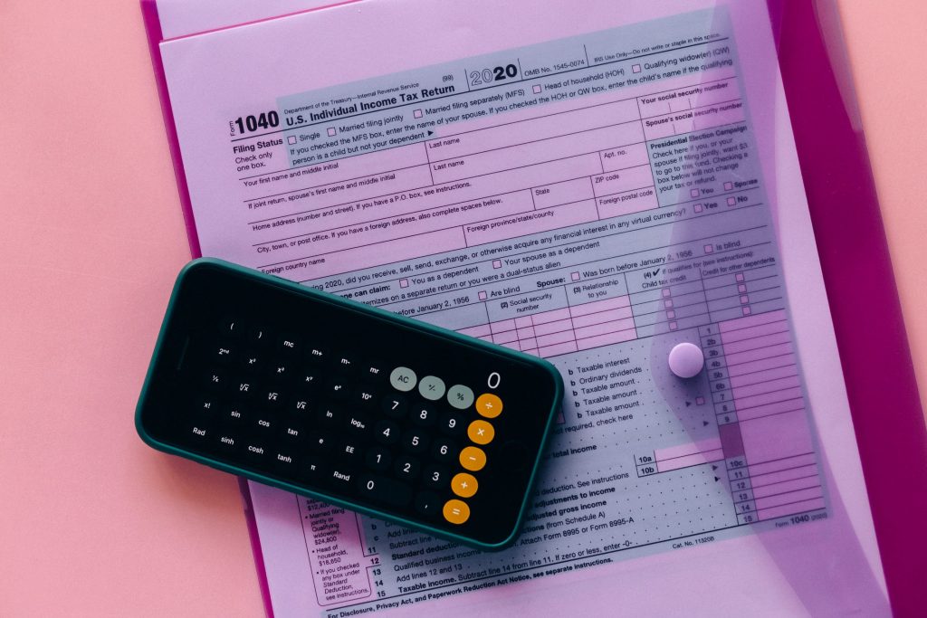 Calculator and tax form inside the clear envelope