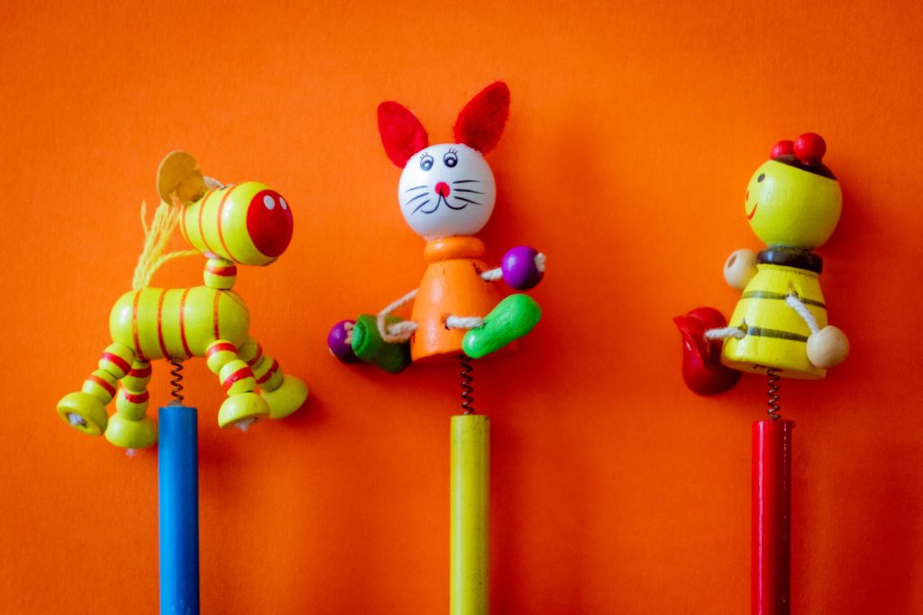toys placed on orange background