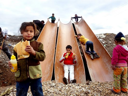 Children playing on the slide