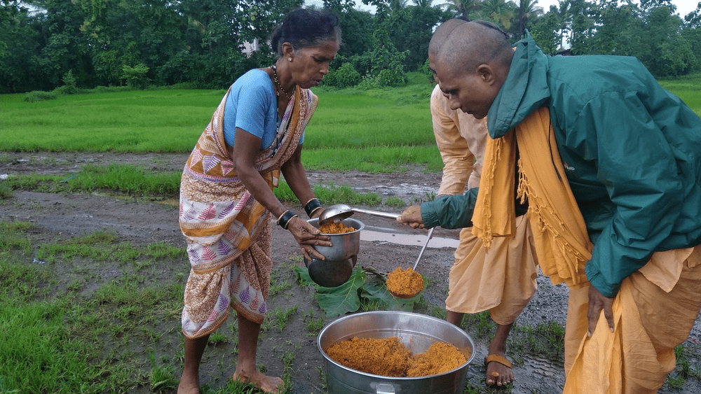 Person serving food in remote places