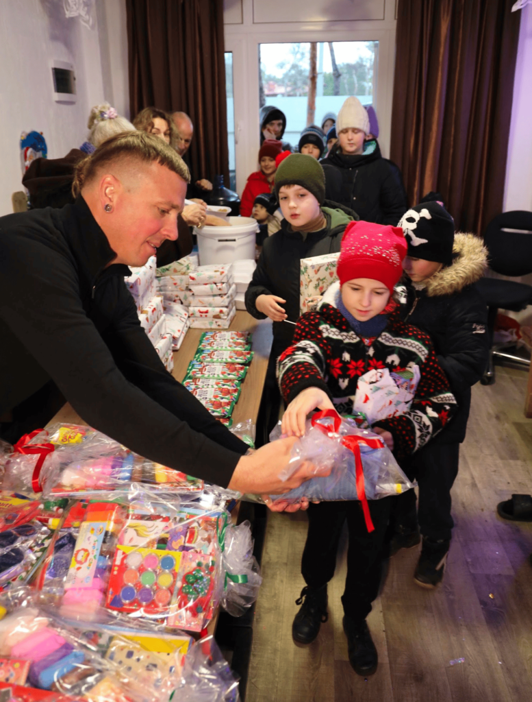 Emergency team giving gifts at an orphanage in Odessa.